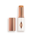 UNREAL SKIN SHEER GLOW TINT HYDRATING FOUNDATION STICK 10 TAN